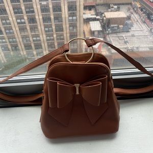 Cute brown leather backpack